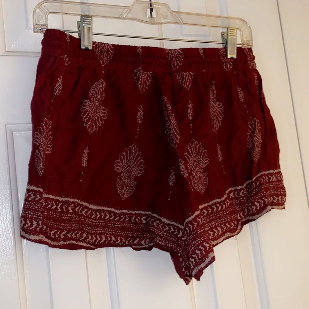 •Red flowy shorts•